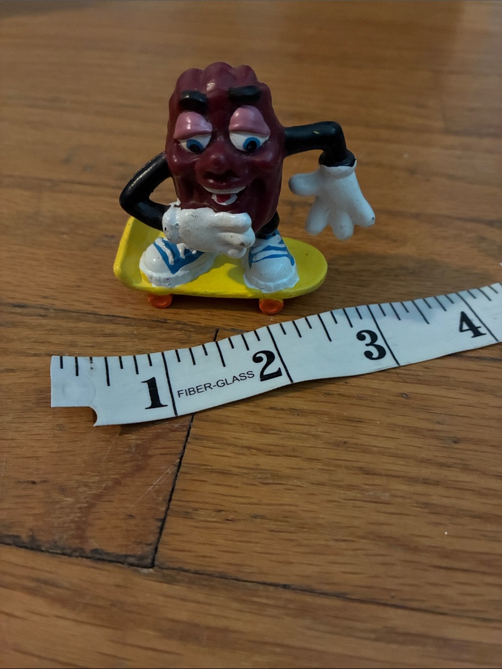 Vintage 1980s California Raison Skateboard Toy Figure with Yellow Board